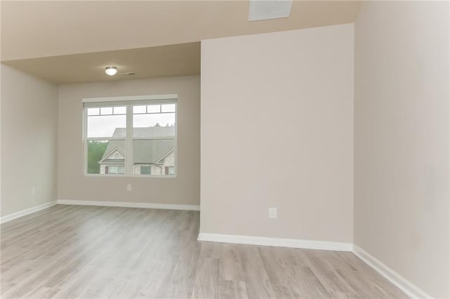 empty room featuring light hardwood / wood-style flooring