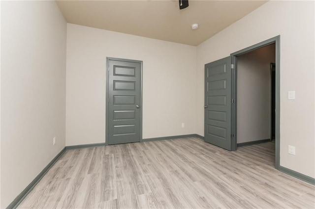 unfurnished bedroom with light hardwood / wood-style flooring