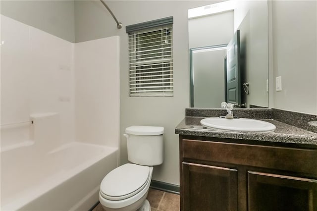 full bathroom with tile patterned flooring, vanity, toilet, and shower / washtub combination