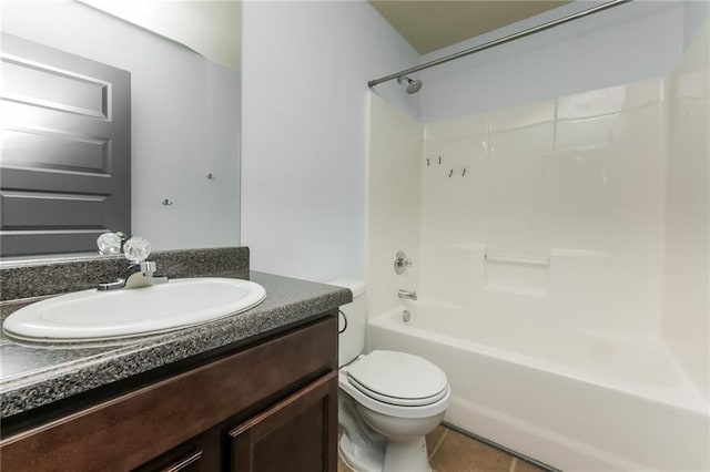 full bathroom with tile patterned floors, vanity,  shower combination, and toilet