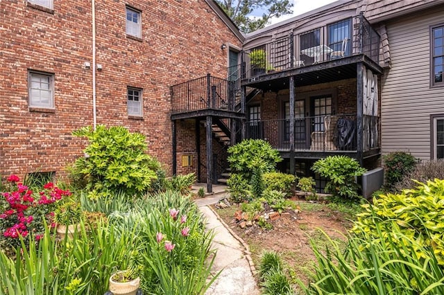 doorway to property with brick siding
