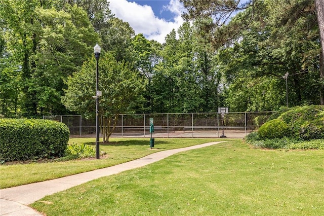 view of community with community basketball court
