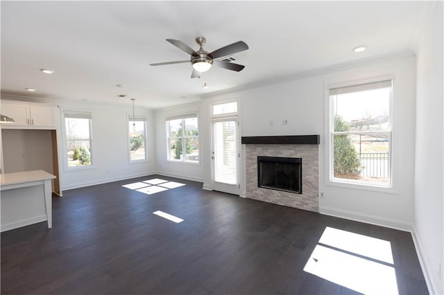 702 Dodd Ln Unit 159, Buford, GA 30518 - unfurnished living room featuring baseboards, recessed lighting, a fireplace, dark wood finished floors, and ceiling fan