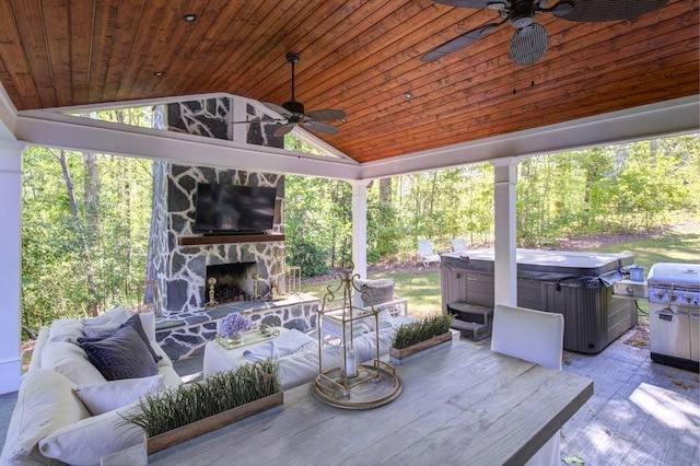 3519 Sunderland Way NE, Brookhaven, GA 30319 - view of patio / terrace featuring a hot tub, a ceiling fan, an outdoor living space with a fireplace, and grilling area