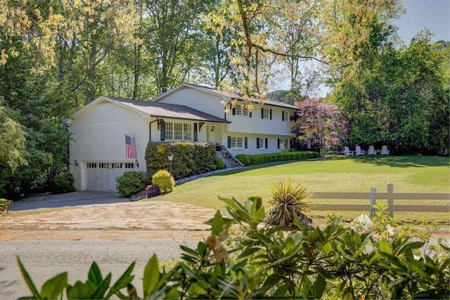 3519 Sunderland Way NE, Brookhaven, GA 30319 - tri-level home with a garage, concrete driveway, and stairs