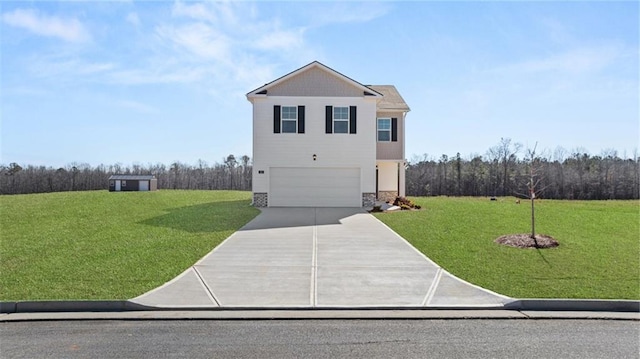 view of front of house with a garage, driveway, and a front lawn