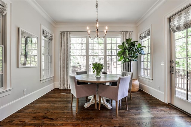 156 Lake Forrest Ln NE, Atlanta, GA 30342 - dining space featuring a chandelier, healthy amount of natural light, dark wood-type flooring, and crown molding