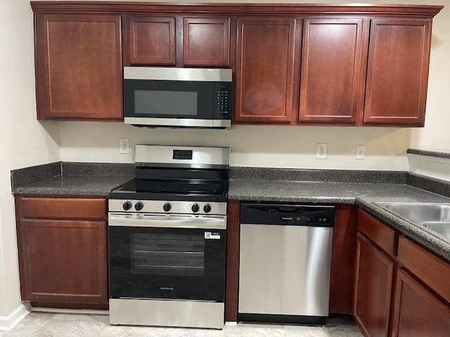 3108 Broadleaf Trl, Fairburn, GA 30213 - kitchen featuring stainless steel appliances and dark countertops