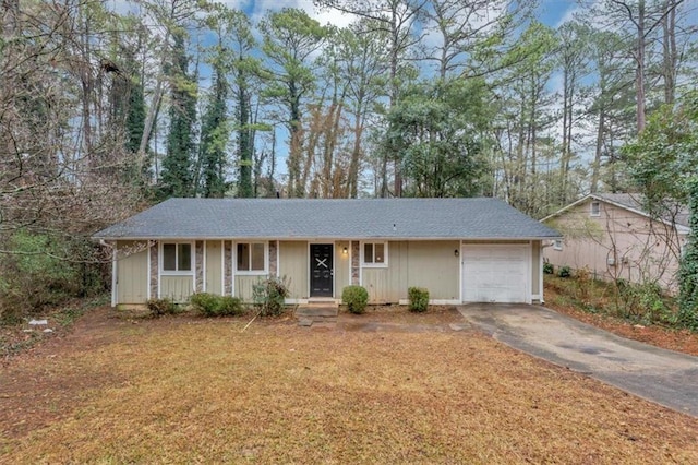 single story home featuring a garage