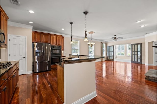 6350 Manningtree Ct, Cumming, GA 30041 - kitchen featuring stainless steel fridge with ice dispenser, ornamental molding, brown cabinetry, dark wood-type flooring, and recessed lighting