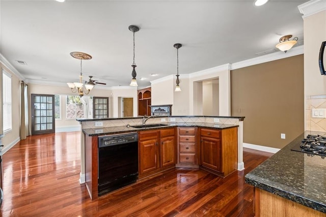 6350 Manningtree Ct, Cumming, GA 30041 - kitchen featuring black appliances, a sink, a chandelier, brown cabinetry, and dark wood-style flooring