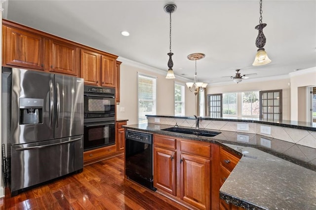 6350 Manningtree Ct, Cumming, GA 30041 - kitchen featuring black appliances, a sink, ornamental molding, dark wood-type flooring, and tasteful backsplash