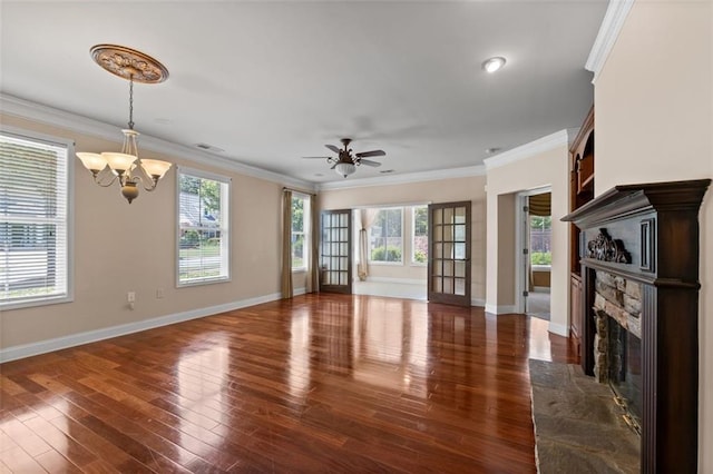 6350 Manningtree Ct, Cumming, GA 30041 - unfurnished living room with a fireplace, a chandelier, wood finished floors, baseboards, and ceiling fan