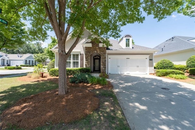 6350 Manningtree Ct, Cumming, GA 30041 - traditional home with driveway, an attached garage, and stone siding