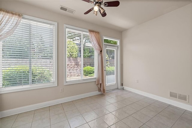 6350 Manningtree Ct, Cumming, GA 30041 - empty room featuring ceiling fan, healthy amount of natural light, baseboards, and light tile patterned floors