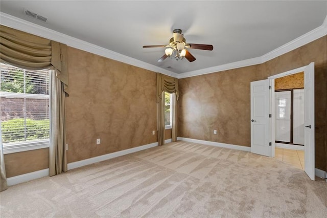 6350 Manningtree Ct, Cumming, GA 30041 - empty room with crown molding, light carpet, a ceiling fan, and baseboards
