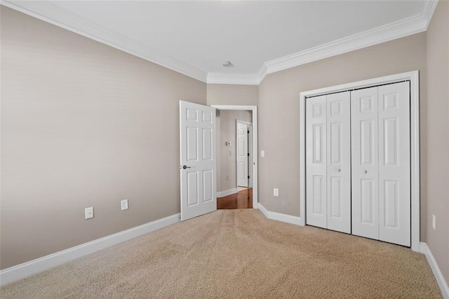 6350 Manningtree Ct, Cumming, GA 30041 - unfurnished bedroom featuring ornamental molding, carpet, baseboards, and a closet