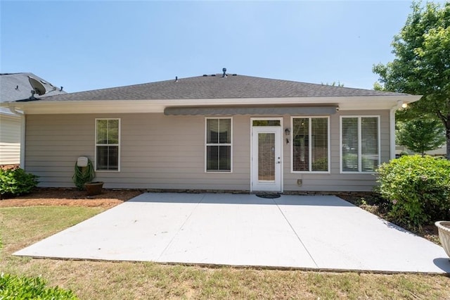 6350 Manningtree Ct, Cumming, GA 30041 - rear view of property with a patio area