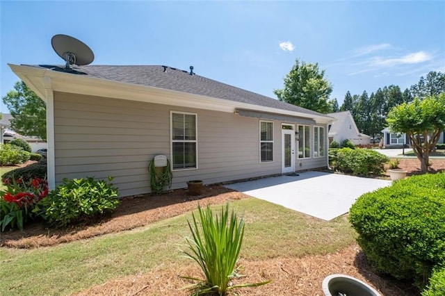 6350 Manningtree Ct, Cumming, GA 30041 - back of house featuring a patio and a lawn