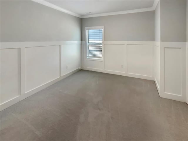 108 Hickory Run, Canton, GA 30115 - carpeted spare room featuring crown molding, wainscoting, and a decorative wall