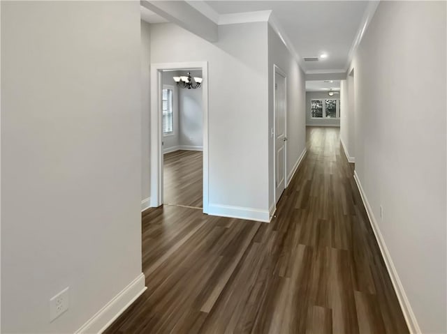 108 Hickory Run, Canton, GA 30115 - hall with crown molding, visible vents, baseboards, dark wood-type flooring, and a chandelier