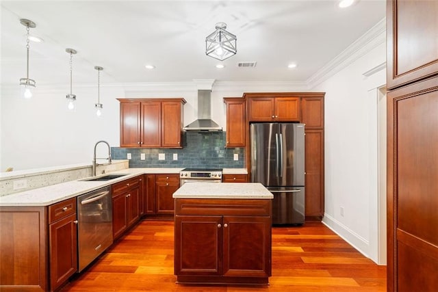 2855 Middlecreek Way Unit 2855, Cumming, GA 30041 - kitchen featuring appliances with stainless steel finishes, wall chimney exhaust hood, a sink, a peninsula, and decorative backsplash