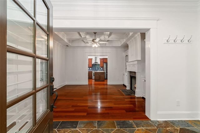 2855 Middlecreek Way Unit 2855, Cumming, GA 30041 - unfurnished living room with crown molding, ceiling fan, dark wood-style floors, a fireplace with flush hearth, and baseboards