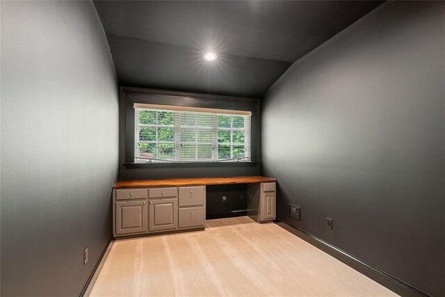2855 Middlecreek Way Unit 2855, Cumming, GA 30041 - unfurnished office with built in desk, vaulted ceiling, baseboards, light carpet, and recessed lighting