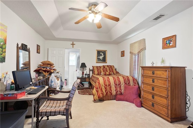 3405 Spring Chase Ln, Ellenwood, GA 30294 - carpeted bedroom with a raised ceiling, an office area, and ceiling fan