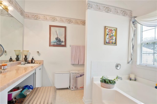 3405 Spring Chase Ln, Ellenwood, GA 30294 - bathroom featuring a garden tub and vanity