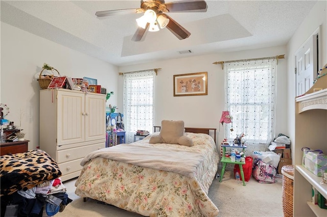 3405 Spring Chase Ln, Ellenwood, GA 30294 - bedroom with carpet, ceiling fan, and a raised ceiling