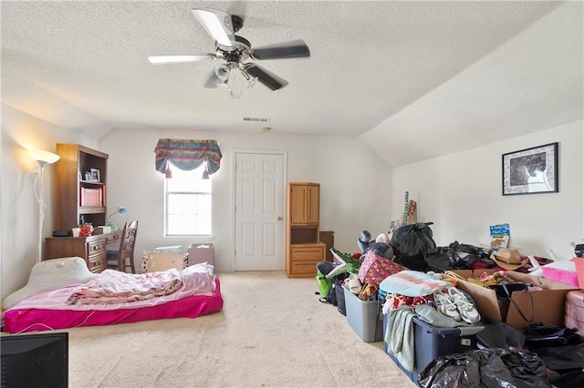 3405 Spring Chase Ln, Ellenwood, GA 30294 - bedroom featuring carpet floors, vaulted ceiling, ceiling fan, and a textured ceiling