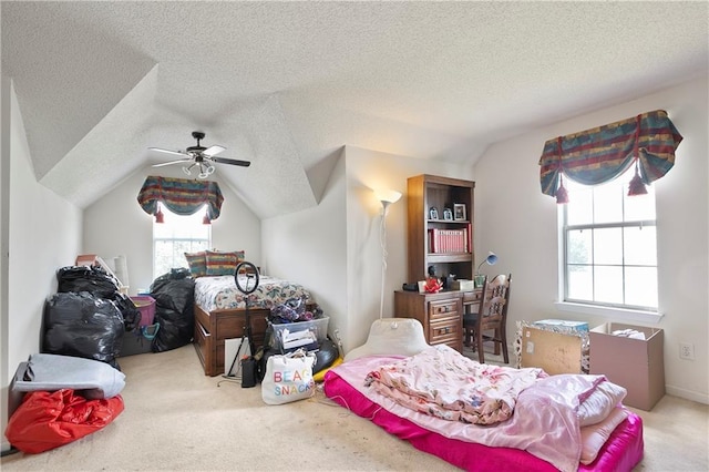 3405 Spring Chase Ln, Ellenwood, GA 30294 - carpeted bedroom with lofted ceiling, a textured ceiling, and a ceiling fan