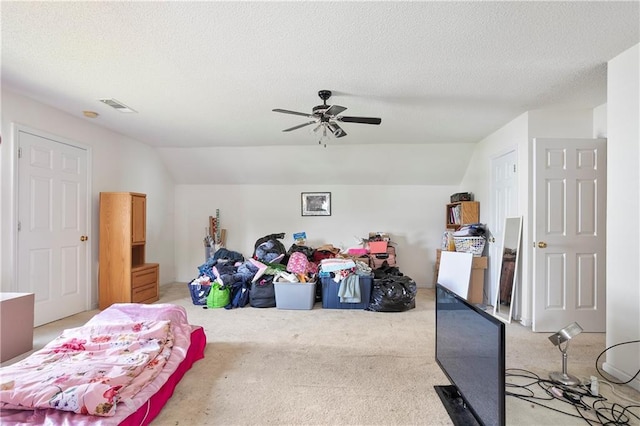 3405 Spring Chase Ln, Ellenwood, GA 30294 - bedroom featuring light carpet, lofted ceiling, a ceiling fan, and a textured ceiling