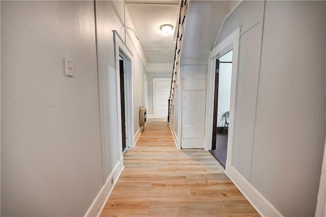 corridor featuring light wood-type flooring