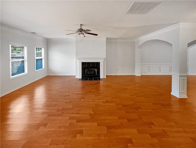 carpeted empty room featuring visible vents, a ceiling fan, baseboards, and vaulted ceiling