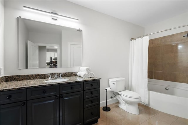325 E Paces Ferry Rd NE Unit 313, Atlanta, GA 30305 - full bath with vanity, toilet, shower / bath combo, tile patterned flooring, and baseboards