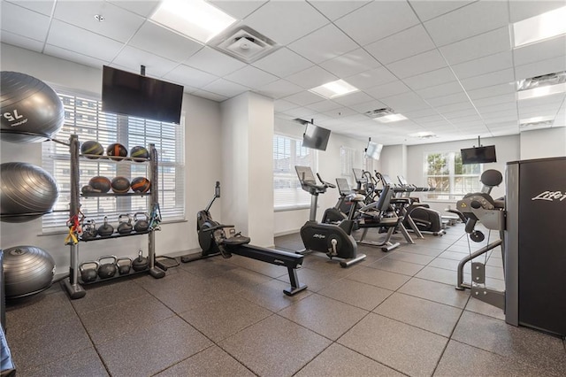 325 E Paces Ferry Rd NE Unit 313, Atlanta, GA 30305 - workout area featuring plenty of natural light and a paneled ceiling