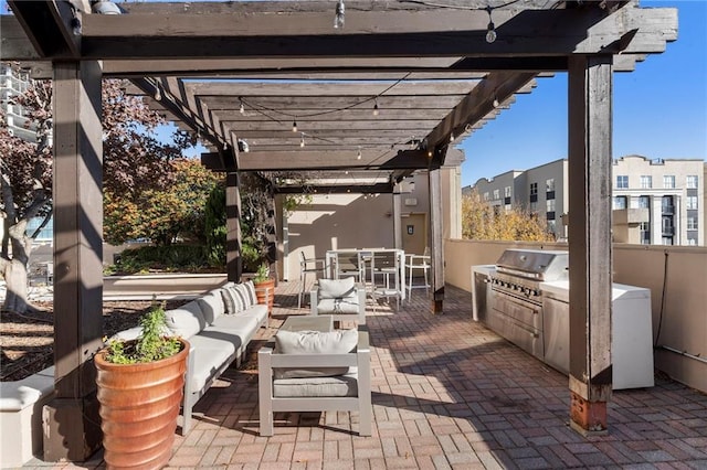325 E Paces Ferry Rd NE Unit 313, Atlanta, GA 30305 - view of patio featuring a pergola, outdoor dining space, and an outdoor hangout area