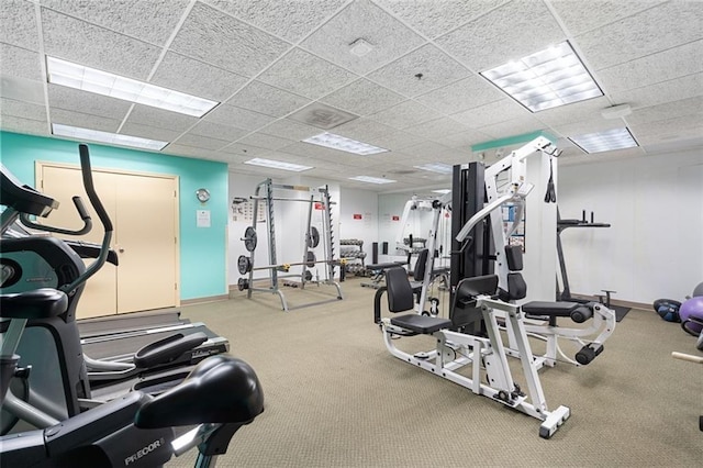 57 Forsyth St NW Unit 4H, Atlanta, GA 30303 - gym with baseboards, a paneled ceiling, and carpet flooring