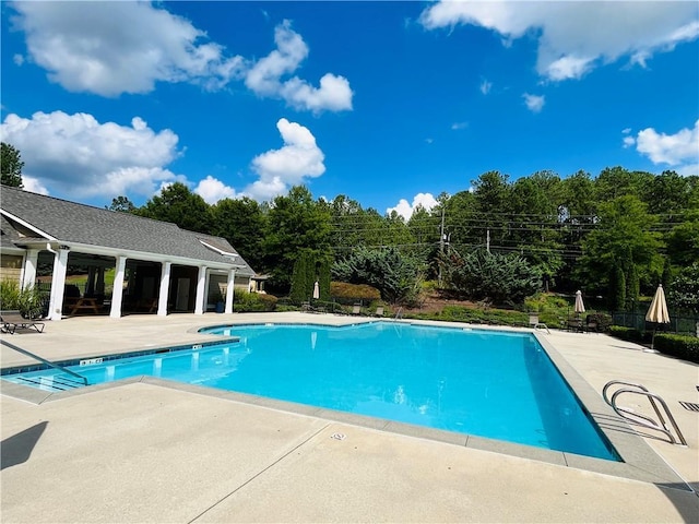 community pool featuring a patio