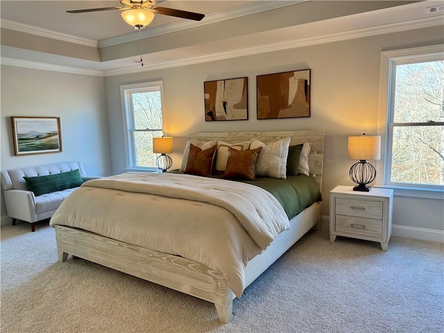 7580 Sunridge Ln, Douglasville, GA 30135 - bedroom featuring crown molding, a tray ceiling, light colored carpet, baseboards, and ceiling fan