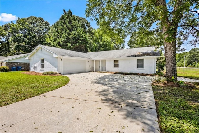 1698 Brandy Woods Trl SE, Conyers, GA 30013 - single story home with driveway, a garage, and a front yard