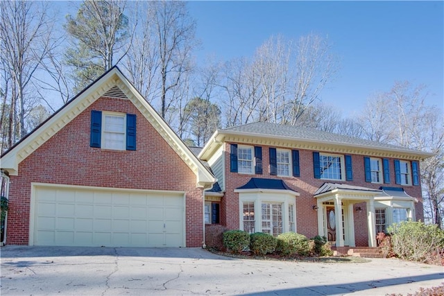 view of front of property featuring a garage