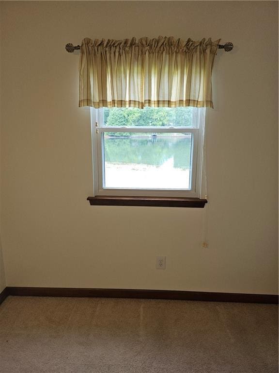 2752 Inverloch Cir, Duluth, GA 30096 - spare room with carpet floors and baseboards
