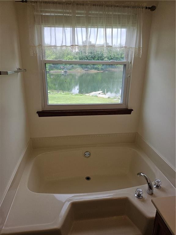 2752 Inverloch Cir, Duluth, GA 30096 - bathroom with a garden tub and vanity