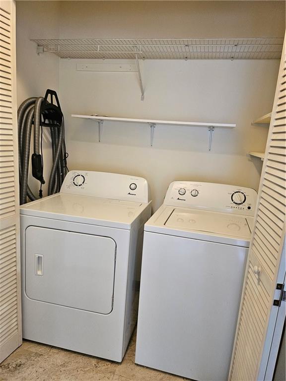 2752 Inverloch Cir, Duluth, GA 30096 - laundry area with washing machine and clothes dryer