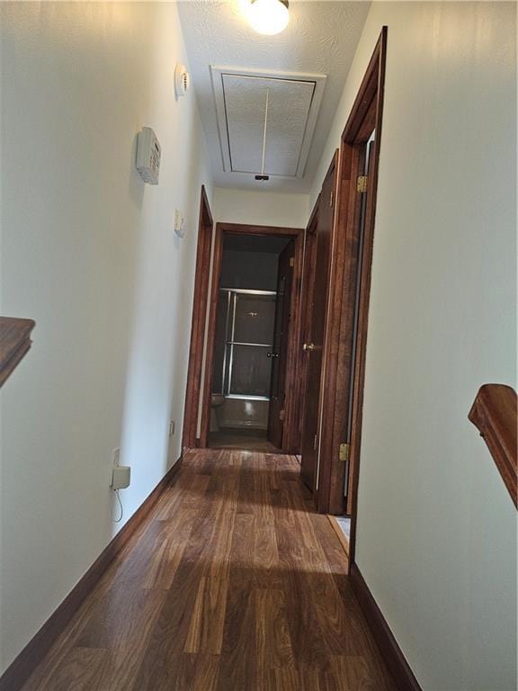 2752 Inverloch Cir, Duluth, GA 30096 - corridor featuring attic access and dark wood-style flooring