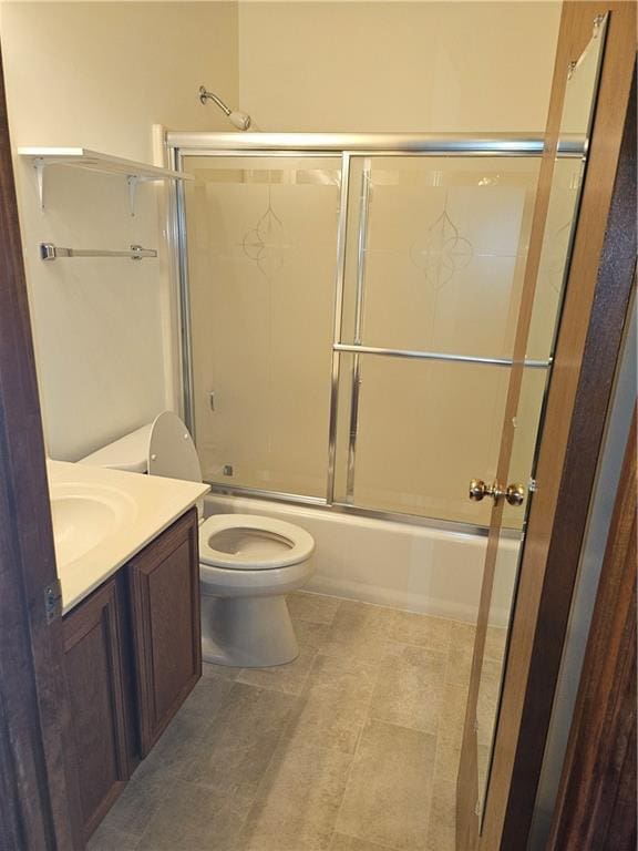 2752 Inverloch Cir, Duluth, GA 30096 - bathroom with toilet, combined bath / shower with glass door, and vanity