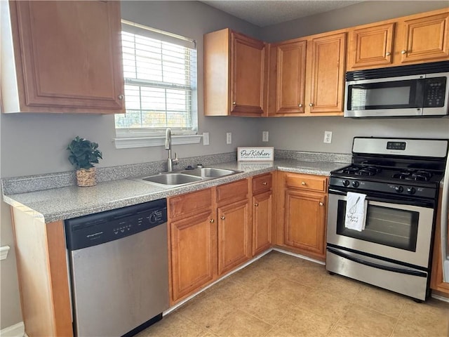 kitchen with stainless steel appliances and sink